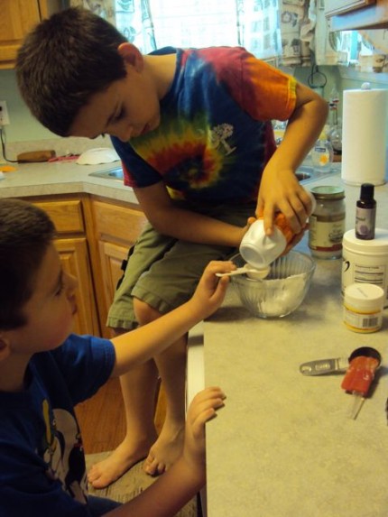 Riley and Caden making toothpaste